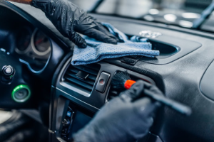 Professional interior car detailing in Fresno, CA – deep cleaning of seats, carpets, dashboard, and vents for a spotless finish